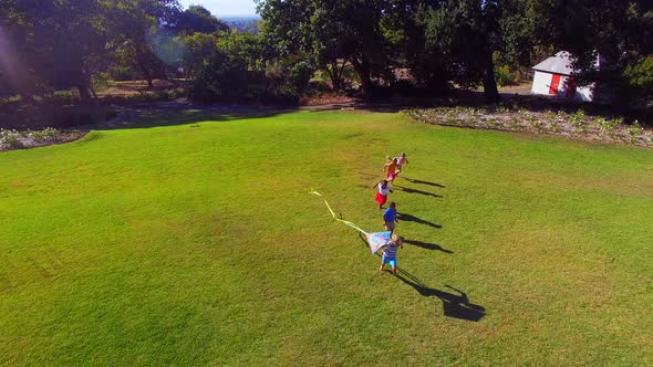 Kids playing in park alt