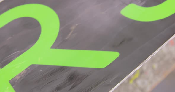 Dolly Shot Of Freeze Wax. Snowboard Maintenance And Repair Concept. alt