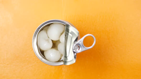 Longans Fruits in a Tin Container Color Background alt