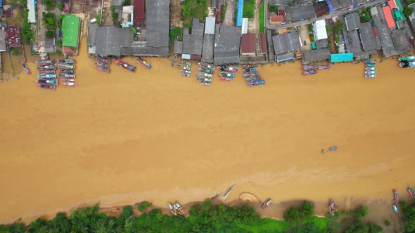 Aerial view over the river, harbor and fishing villages alt