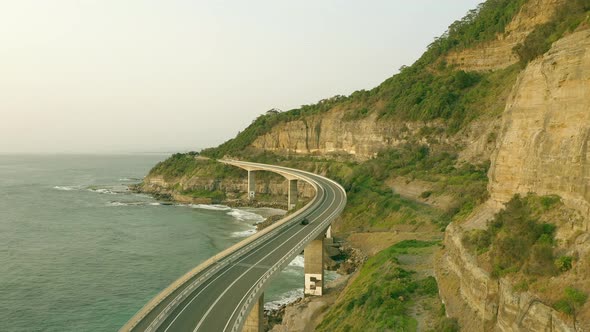 Aerial View of Vehicles on the Sea Cliff Bridge