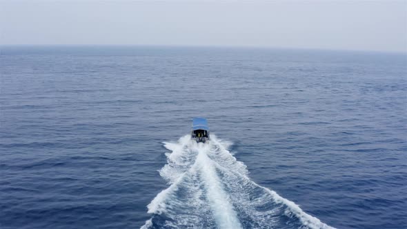 A Speed Boat Is Bringing the Divers to Diving Spots in Tenggol Island