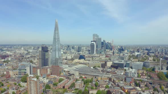 Establishing drone shot of London The Shard and Central Skyscrapers alt