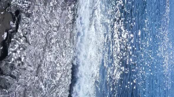 Vertical Video Sea Near the Coast  Closeup of the Coastal Seascape alt