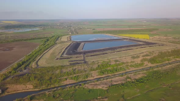 Landfill for Solid Waste of a Thermal Power Plant. Aerial Video of a Crowded Ash Dump. Ash, Slag