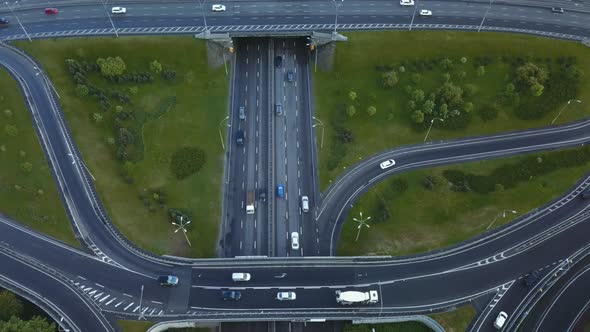 Aerial View Flying Over of Loaded Cars with Traffic Jam at Rush Hour on Highway with Bridge