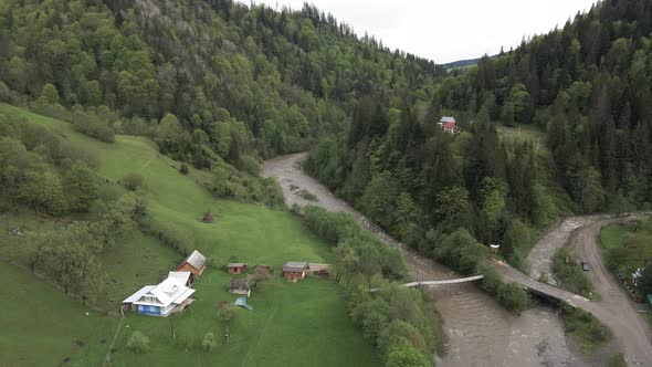 River in the Mountains. Slow Motion. Carpathians. Ukraine. Aerial. alt