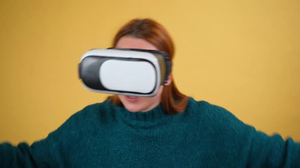 Young Red Hair Woman Posing Isolated on Yellow Color Background Studio alt