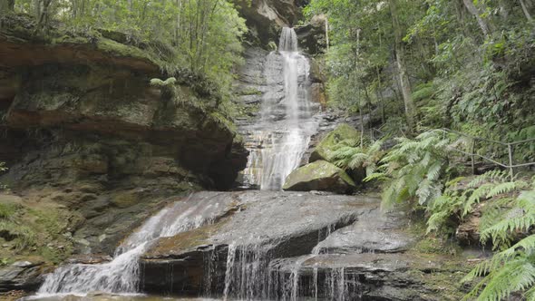 close up tilt down clip of empress falls at katoomba in the blue mountains alt