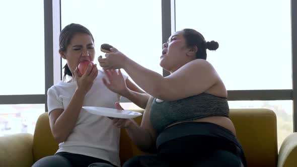 Obese woman enjoy eating cakes, but instead of healthy eating and weight loss alt