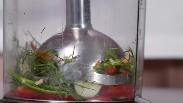Immersion Blender Grinds Vegetables