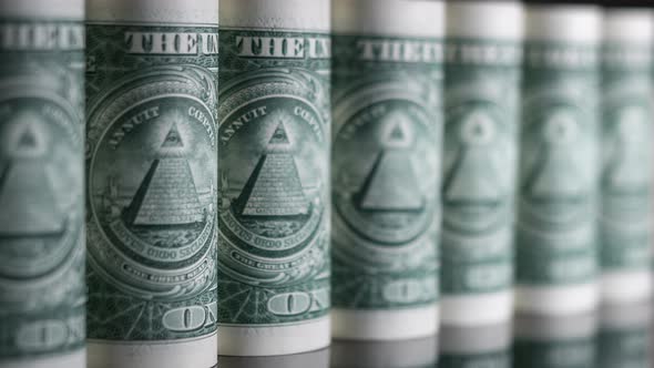 Dolly in US One dollar banknotes. Selective focus. alt