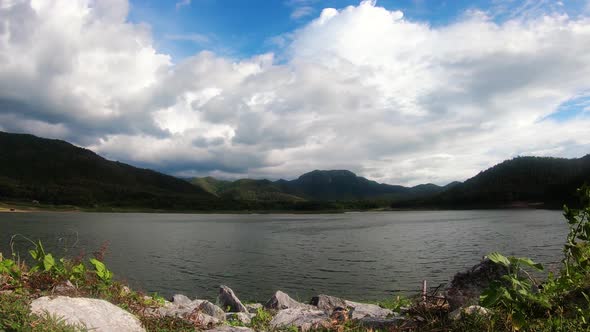 Timelapse of Beautiful cloud above moutain and lake, Footage B roll.