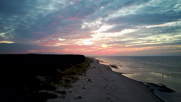 Aerial View Over the Kolka Cape, Baltic Sea, Latvia. During Autumn Evening Sunset alt