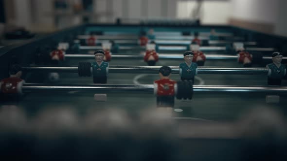 Miniature Foosball Players Figures on Table Close Up alt