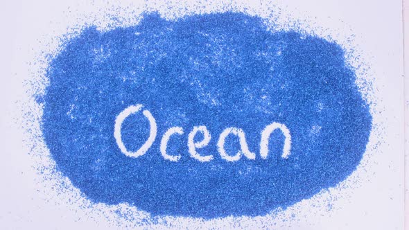 Indian Hand Writes On Blue Ocean