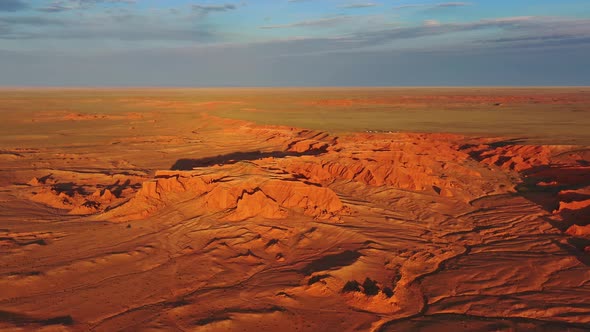 Bayanzag Flaming Cliffs at Sunset in Mongolia alt