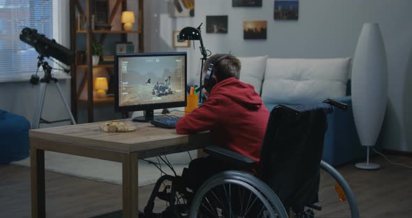 Boy Watching Movement of a Mars Rover alt