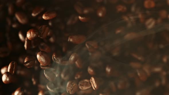Super Slow Motion Shot of Exploding Premium Coffee Beans Towards the Camera at 1000Fps alt