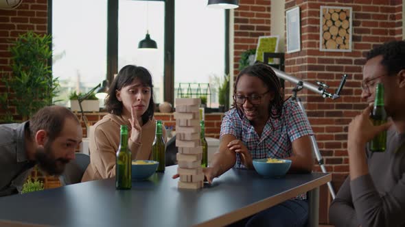 Competitive Person Enjoying Society Game Play with Friends alt