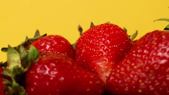Fresh Strawberry Summer Berries Close Up Isolated on Yellow Background