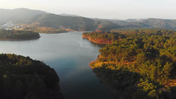Unique aerial view at sunset of awesome Tuyen Lam Lake Da Lat plateau Vietnam alt