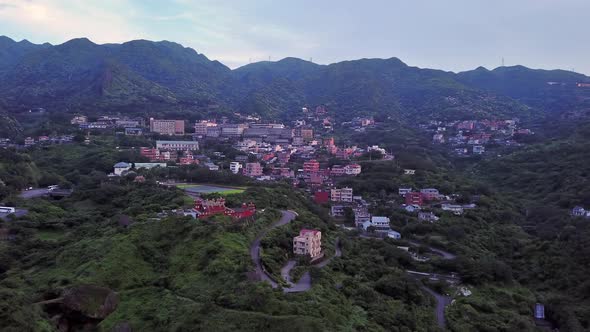 Aerial view of buildings in Jiufen village on mountain hill in Taipei, Taiwan. alt