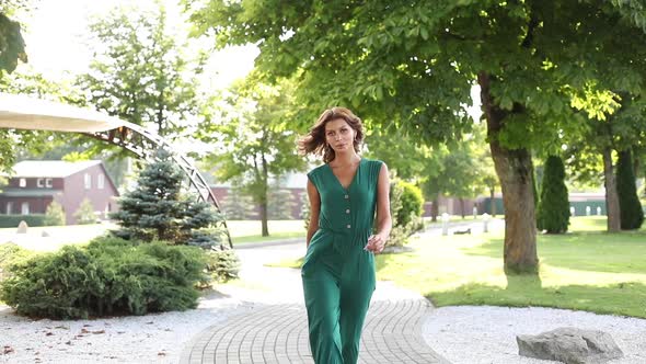 Fashion Attractive Young Girl Smiling Approaching Walking Outdoor Full Shot  Footage