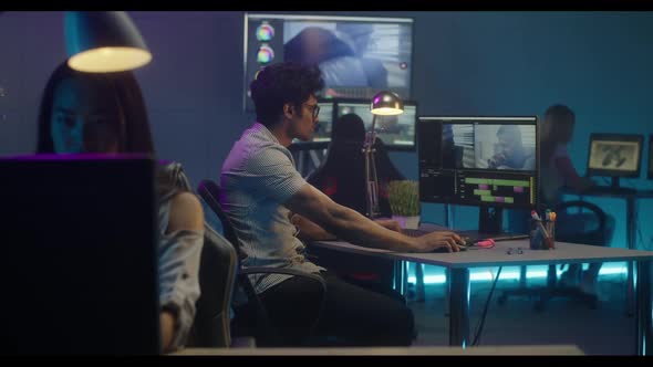 Video Editors at Work in Editing Room alt