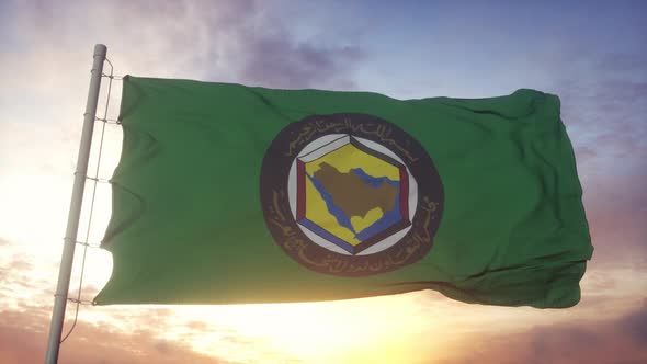 Flag of Gulf Cooperation Council Waving in the Wind Sky and Sun Background alt