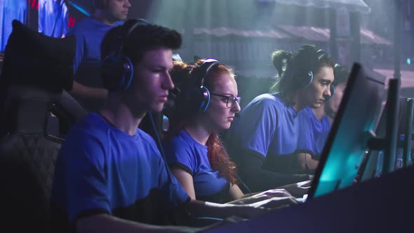 Gamers with Trainer Playing Videogame alt