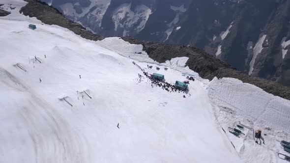 Aerial drone shot of the Deux Alpes Ski Resort during summer time. Orbit shot with a beautiful paral alt