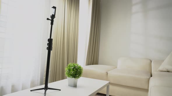 indoor design interior with white sofa and all-white items alt