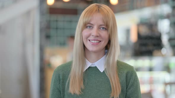 Portrait of Young Woman Talking on Online Video Call alt