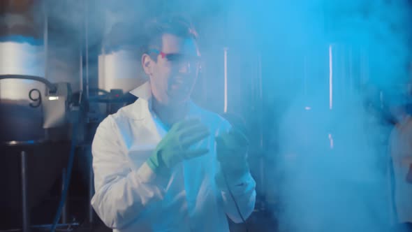 Evil Professor Pushing Remote Controller Button in Large Industrial Laboratory alt