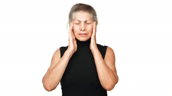 Older Mature Woman Touching Her Temples Trying to Remember Finally Figure Out Recall Something alt