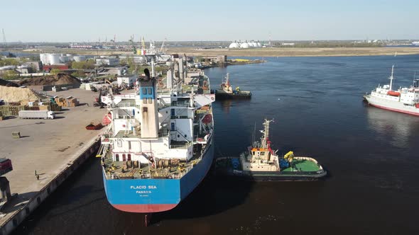 Cargo ship in port alt