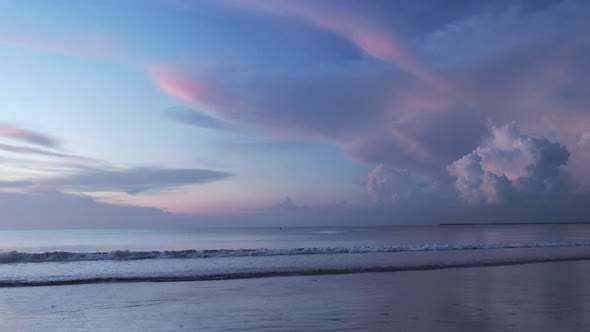 Beautiful Sunset at the Beach, Amazing Colors, Light Beam Shining Through the Cloudscape