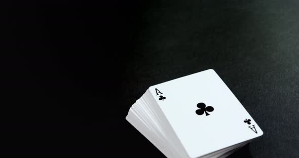 Playing cards on poker table 4k alt