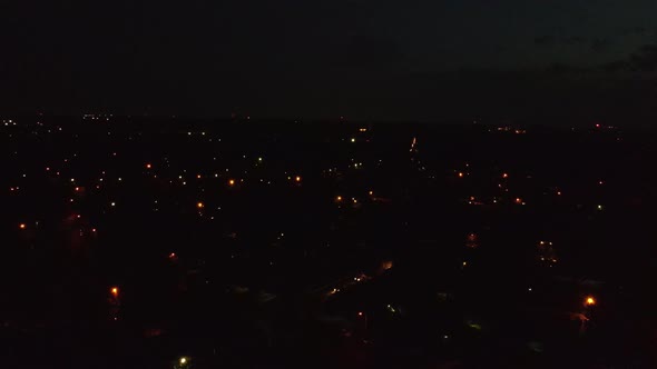 Beautiful colorful celebration fireworks over on a American small town of aerial view alt