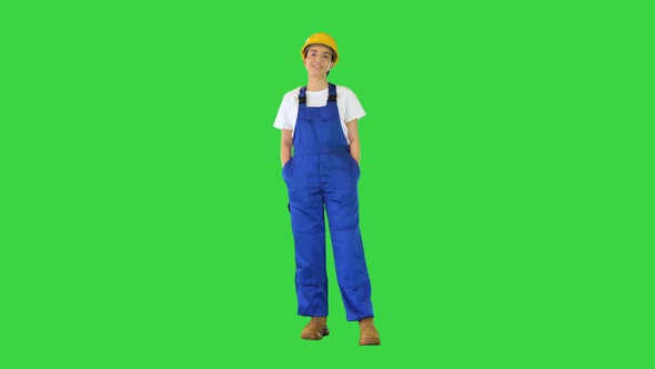 Young Craftswoman Standing and Smiling on a Green Screen Chroma Key