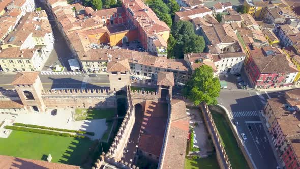 Verona, Italy: Aerial view of Castelvecchio Castle.Drone flies over the old city. Aerial video alt