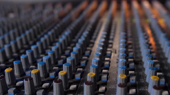 Macro Slide Shot of a Music Mixer with Editing Tools in a Professional Recording Studio