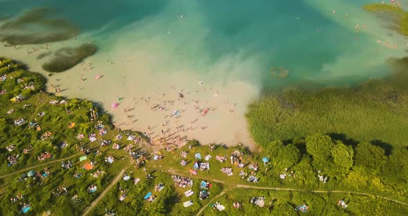 People Taking Sun Baths at Lake Dontso in Leningrad Region Saint Petersburg Russia Aerial Footage of