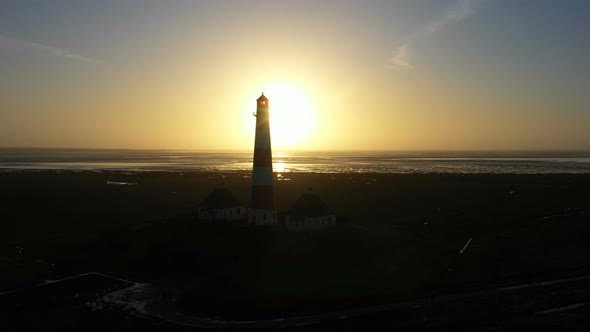 Lighthouse at Sunset, Aerial View, Silhouette