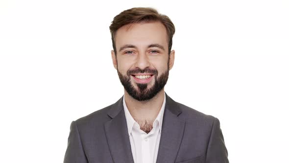 Portrait of Pleased Man 30s with Attractive Appearance Smiling Broadly with Perfect Teeth Feeling alt