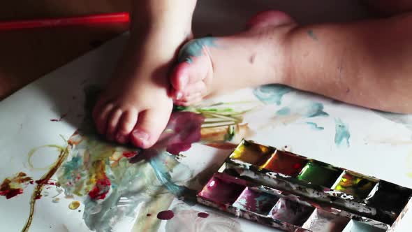 Child Draws Paints