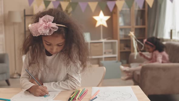 Sister Joining Girl Drawing at Home alt