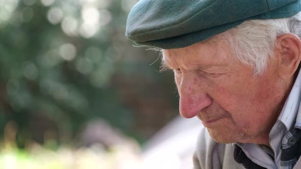 The Old Grandfather Looks Down Thoughtfully He is Depressed alt