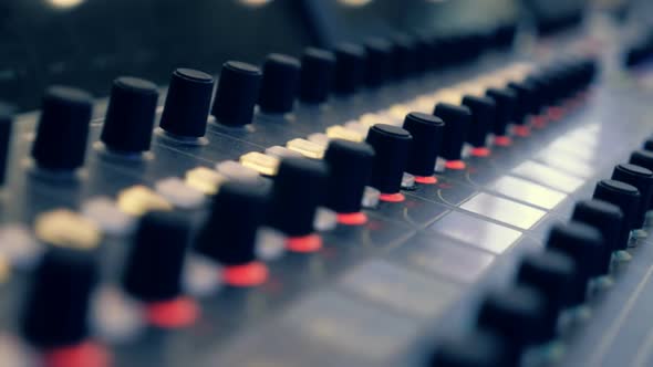 Professional Video Mixing Console Where Many Knobs And Many Reflections